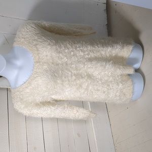 Soft and fuzzy cream colored 3/4 sleeve sweater
